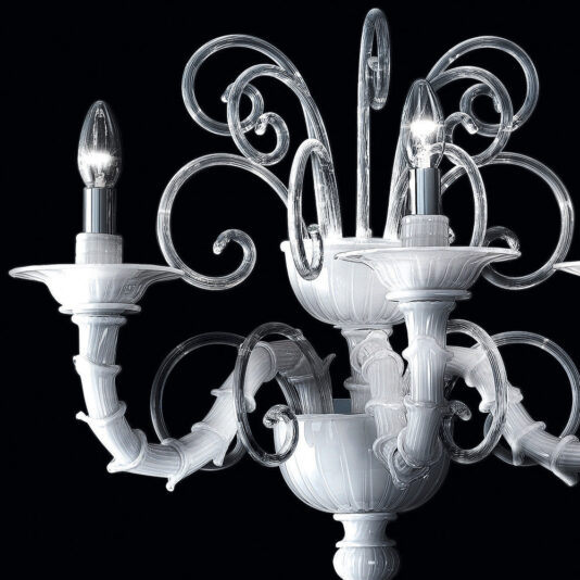 A close-up of the Classic White Glass Wall Light reveals an ornate design with intricate, swirling glass arms and three candle-shaped light bulbs. The detailed craftsmanship is highlighted against a dark background, emphasizing the wall light's elegant and delicate structure, reminiscent of a traditional chandelier.