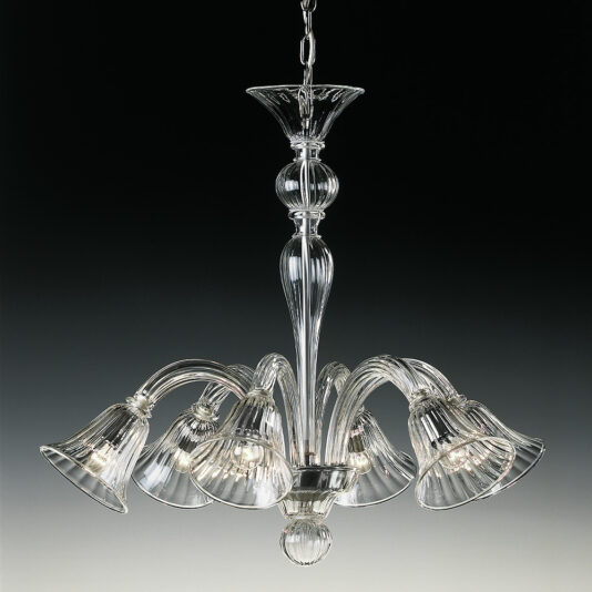 The Clear Ribbed Detail Glass Chandelier features a central rod and six gracefully curved arms, each finishing in a bell-shaped lamp. Its intricately detailed glass adds an elegant and classic touch. Suspended from a chain, this chandelier stands out beautifully against dark backgrounds.