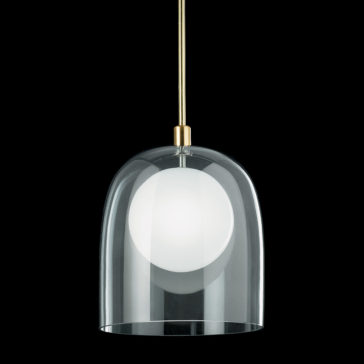 Contemporary Long Glass Dome Pendant Light The Contemporary Long Glass Dome Pendant Light features a sleek brass stem and mount, complemented by a minimalist clear glass dome-shaped shade that elegantly showcases a white spherical inner bulb. The design is contemporary and refined, standing out beautifully against a black background.