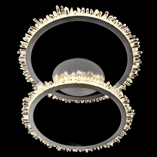 The Double Ring Quartz Crystal Nickel Ceiling Light showcases two concentric nickel rings embellished with quartz crystal-like accents along their edges. The rings are illuminated from within, creating a dazzling and sophisticated look against a black background.