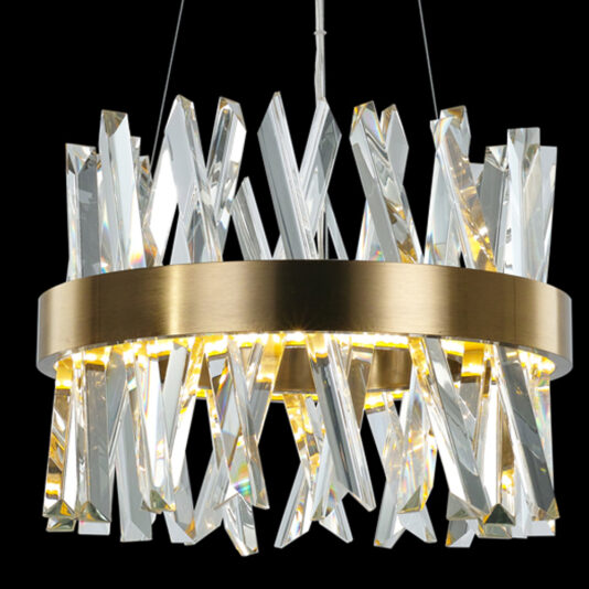 Exclusive Small Brass Pendant Light The Exclusive Small Brass Pendant Light boasts a modern chandelier design with sleek, clear angular crystals arranged around an exclusive circular, metallic brass frame. The crystals reflect the light to create a vibrant, multifaceted effect against a black background.
