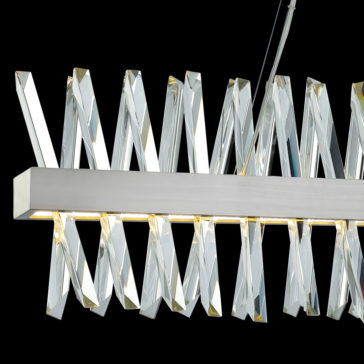 Narrow Nickel Crystal Chandelier The Narrow Nickel Crystal Chandelier showcases a sleek, modern design with a horizontal, rectangular metallic frame in narrow nickel. It is adorned with a series of twisted, clear acrylic or glass elements arranged diagonally to form an elegant geometric pattern against a solid black background.