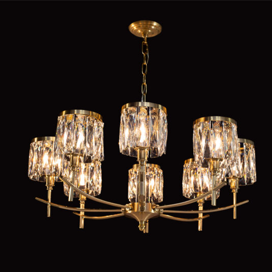 A luxurious High End 8 Arm Nickel Chandelier with eight candle-like light fixtures, each adorned with crystal-like glass shades, hangs from the ceiling. The chandelier's elegant design stands out against a black background.
