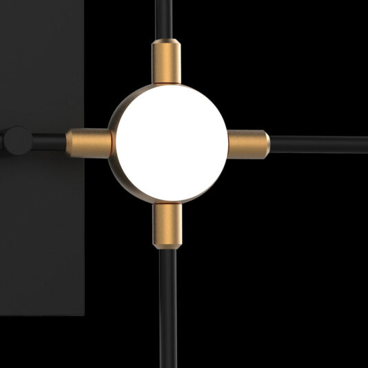 A close-up image of the Luxury Black And Gold Wall Light. The design showcases a central circular white light with four gold-colored arms extending outward. Set against a solid black background, the contrast enhances and highlights the fixture's elegant design elements.