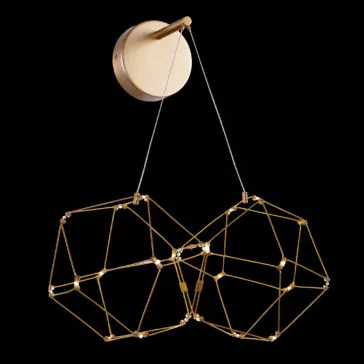 Luxury Double Prism Brass Wall Light The Luxury Double Prism Brass Wall Light showcases a modern round gold base with two interconnected geometric wireframe shapes suspended from thin cables. The design resembles abstract polyhedrons, providing a contemporary and artistic aesthetic against the black background.