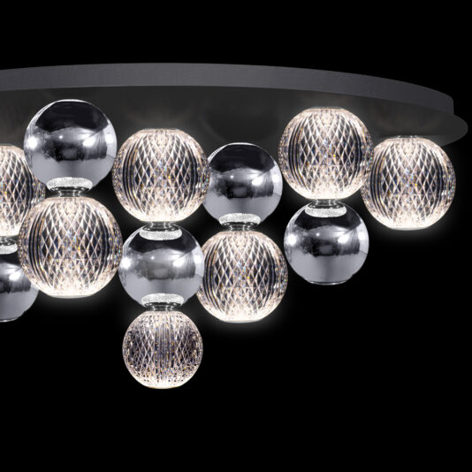 Luxury Chrome Globe Ceiling Light The Luxury Chrome Globe Ceiling Light is a high-end ceiling fixture that features multiple spherical bulbs encased in reflective metal and mesh covers, creating a stylish and illuminated design. The globe fixture has a sleek, circular base from which the bulbs are suspended at varying lengths.