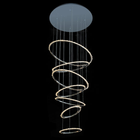 The Quartz Crystal 7 Ring Nickel Chandelier features a modern design with seven illuminated rings spiraling down in size, suspended on thin wires from a sleek round nickel ceiling mount, against a black background.