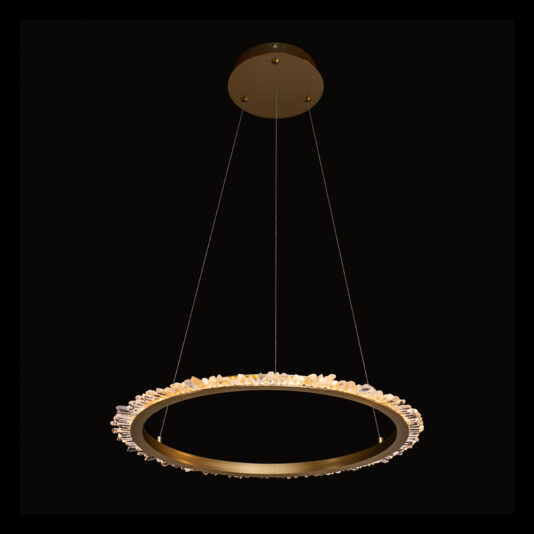 The Small Quartz Crystal Gold Round Chandelier, featuring a decorative rim adorned with small quartz crystals, is suspended from the ceiling by three thin wires. Its modern and elegant design creates a striking contrast against the black background.