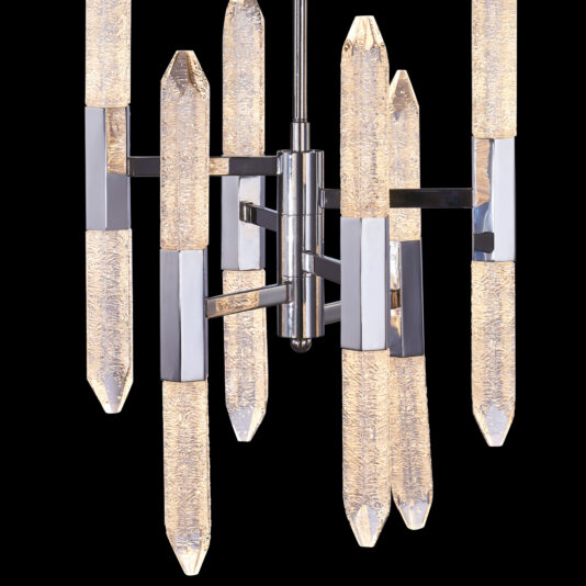 Exclusive Chrome Vertical Crystal Chandelier The Exclusive Chrome Vertical Crystal Chandelier showcases an array of vertical crystal-like rods arranged around a central chrome fixture. Each rod is pointed at the ends and emits a warm light, contributing to its elegant and contemporary design. The polished metallic components are highly reflective, adding to its sophisticated appeal.