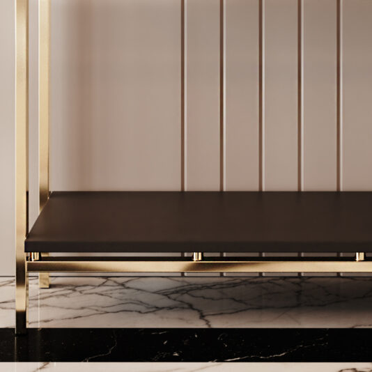 Introducing the Art Deco Inspired Console Table, a minimalistic piece featuring a sleek black shelf supported by gold metallic legs. The background has a beige panel with vertical lines, and the base boasts an elegant black and white marble surface.