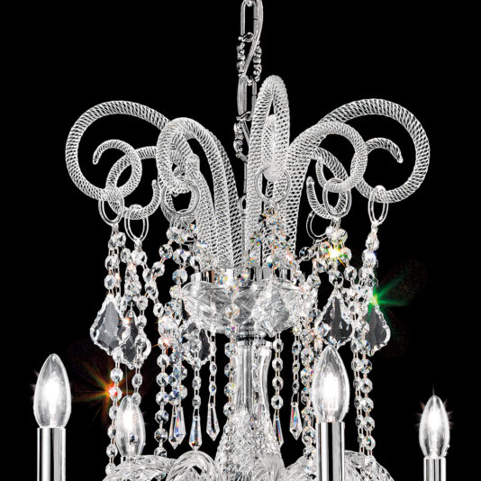 Blown Glass Chandelier With Crystal Drops Close-up of the Blown Glass Chandelier With Crystal Drops, showcasing its ornate design with intricate, looping metal patterns and hanging crystal drops against a black background. The chandelier is adorned with multiple candle-like bulbs, and the crystals reflect light in various colors.