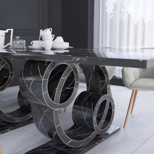 A modern dining room with an Exclusive Rectangular Marble Dining Table featuring unique circular legs. The tabletop is set with white cups, saucers, and a teapot. The room boasts white tile flooring, sheer curtains, and a light-colored cushioned chair in the background.