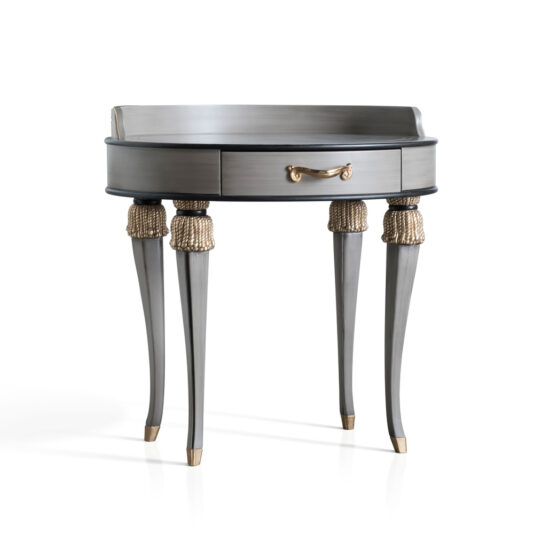 Exclusive Side Table With Tassel Design Detail Introducing the Exclusive Side Table With Tassel Design Detail, a stylish and elegant addition to your interior decor. This round gray piece features four decorative tapered legs with gold accents and a single central drawer adorned with a gold handle. Its elevated back edge adds a touch of sophistication, beautifully blending modern and classic design elements.