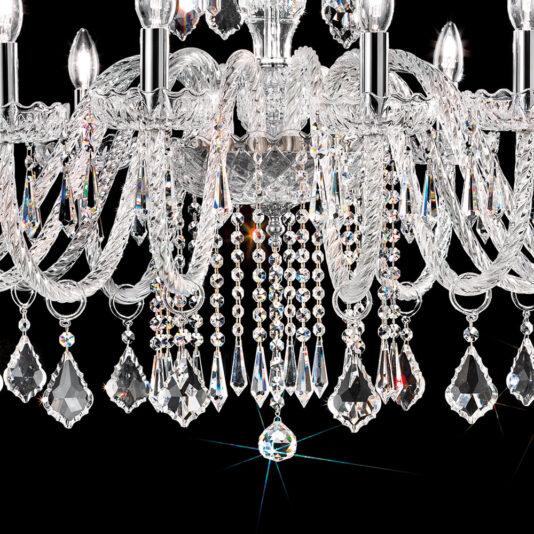 Large Blown Glass Chandelier With Crystal Drops A close-up image showcases the Large Blown Glass Chandelier With Crystal Drops. This chandelier boasts an intricate design featuring multiple crystal pendants and beads hanging from its twisted metal arms. The crystals reflect light, creating a dazzling effect against the dark background, enhancing the chandelier's brilliance.