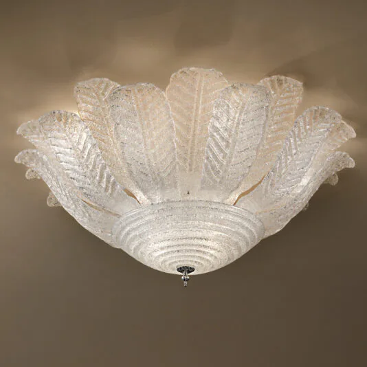 The Large Glass Leaf Ceiling Light showcases frosted glass segments that mimic leaves or petals, arranged in a radiant pattern. Each segment is intricately textured and finished with a subtle sparkle, resulting in an elegant, glowing effect against any neutral backdrop.