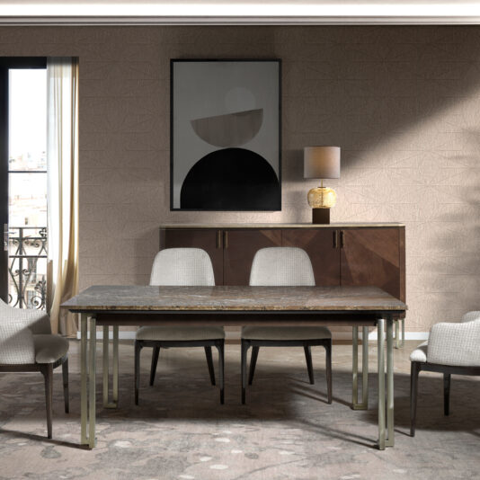 Luxury Chic Dining Set A modern dining room showcasing the Luxury Chic Dining Set, complete with a rectangular table and six gray chairs. A wooden sideboard adorned with gold handles and a lamp enhances the wall, accompanied by abstract black and white artwork above it. Through a door on the left, a balcony with a black railing is visible.