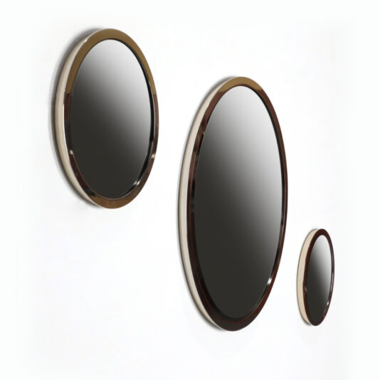 Three Round Modern Wall Mirrors of different sizes are mounted on a white wall. Each mirror has a dark brown frame and a reflective surface, arranged in an asymmetrical pattern.