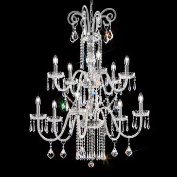 Two Tier Blown Glass Chandelier With Crystals The Two Tier Blown Glass Chandelier With Crystals is a grand lighting fixture featuring multiple arms and tiers. It is adorned with sparkling blown glass pendants and crystals, each arm holding a candle-shaped light bulb. The chandelier emits a radiant glow against a dark background.