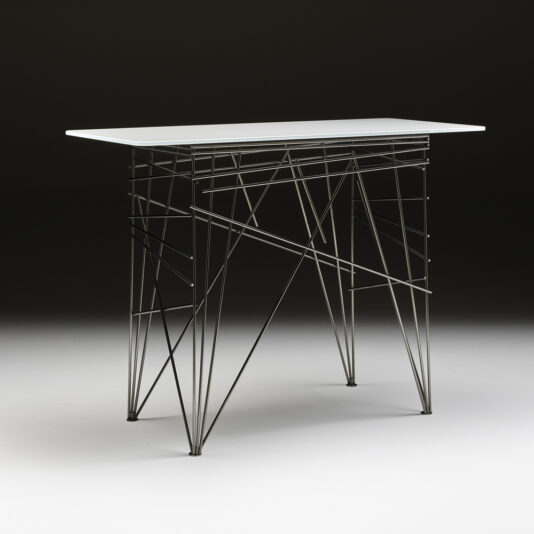 The Contemporary Lacquered Console Table features a sleek white rectangular top paired with an intricately designed metal base composed of geometric wireframe patterns, forming a lattice-like structure. The background transitions from dark at the top to light at the bottom in a gradient.