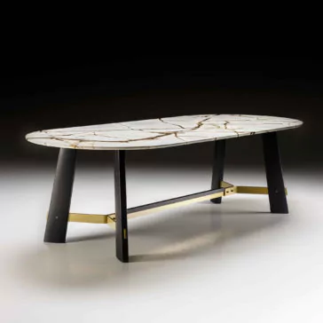 The Contemporary Oval Quartz Dining Table is an elegant, modern dining table boasting rounded corners and a white marble top adorned with gold veining. It stands on four black angled legs with a gold crossbar, blending stability with aesthetic appeal against a gradient black-to-white background.