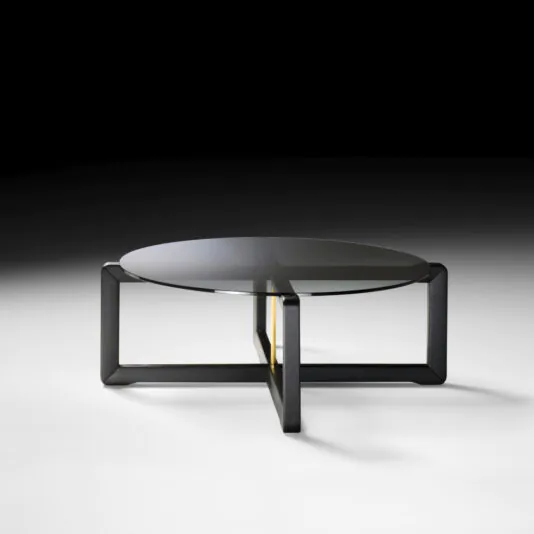 Contemporary Low Round Glass Coffee Table The Contemporary Low Round Glass Coffee Table boasts a minimalist black metal frame and four intersecting rectangular supports, forming an elegant geometric design. Against a gradient background from black to white, this table exudes modern sophistication.
