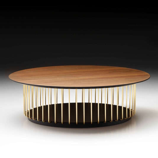 The Contemporary Round Wooden Coffee Table features a distinctive base composed of vertical gold-colored metal rods arranged in a circular pattern, supporting the top and creating an open, airy look. The dark background enhances the table's modern design beautifully.
