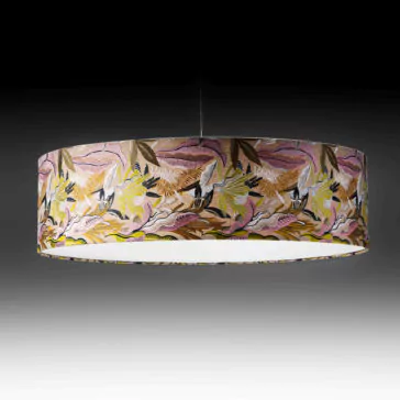 The Elegant Suspension Light With Embroidered Shade features a sophisticated cylindrical lampshade, showcasing an intricate and colorful botanical pattern in pink, yellow, and green hues on a muted backdrop, beautifully suspended against a gradient transition from grey to black.