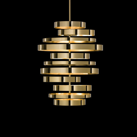 Large Contemporary Chandelier A modern multi-tiered pendant light fixture, the Large Contemporary Chandelier, is suspended against a black background. This golden chandelier features several horizontal, reflective rings stacked above each other, creating an eye-catching sculptural design.