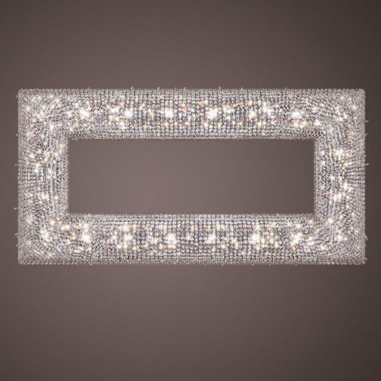 Luxury High End Crystal Chandelier A Luxury High End Crystal Chandelier with a hollow center is suspended against a dark background, adorned with numerous sparkling crystals that create a dazzling and elegant light display.