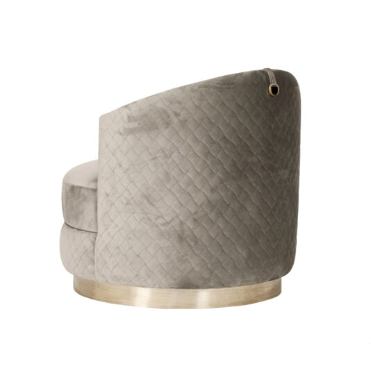 Modern Quilted Velvet Swivel Tub Chair A plush, grey Modern Quilted Velvet Swivel Tub Chair with a rounded back and gold metal base, seen from an angle. The chair boasts a subtle checkered pattern and a decorative pull ring near the top of the backrest.