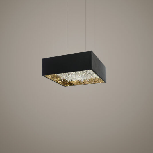 Luxury Square Crystal Chandelier A modern rectangular black pendant light, boasting a textured, reflective interior surface, is suspended by thin wires against a neutral background. Emitting a warm, diffused glow, this fixture evokes the elegance of the Luxury Square Crystal Chandelier with its intricate interior pattern.