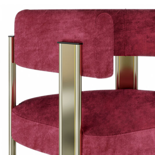 Modern Curved Dining Chair The Modern Curved Dining Chair is a luxurious piece with plush, deep red velvet upholstery and a gold metal frame. It features a rounded backrest and seat, while the elegant gold legs complete its contemporary design. The velvet fabric appears soft and richly textured.
