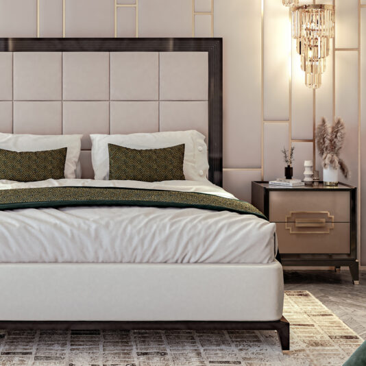 Art Deco Style Bed With Tall Headboard A luxurious bedroom featuring the **Art Deco Style Bed With Tall Headboard**, characterized by its tufted beige design and complemented by green accent pillows. The room is adorned in neutral tones with a hint of gold, showcasing sophisticated lighting and elegant bedside tables accessorized with decorative items.