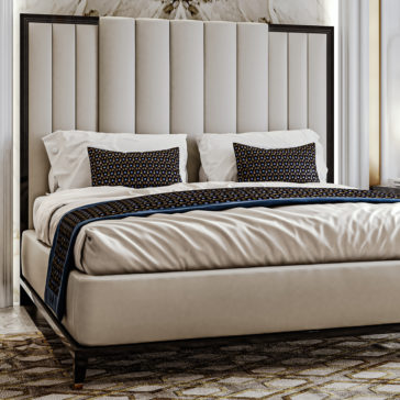 High End Art Deco Style Bed A modern bedroom showcasing the High End Art Deco Style Bed, complete with a large, vertical-panel headboard. The bed is dressed in crisp, white linens and adorned with two patterned pillows and a matching bed runner. The room benefits from bright, natural lighting and elegant decor.