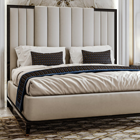 A modern bedroom showcasing the High End Art Deco Style Bed, complete with a large, vertical-panel headboard. The bed is dressed in crisp, white linens and adorned with two patterned pillows and a matching bed runner. The room benefits from bright, natural lighting and elegant decor.