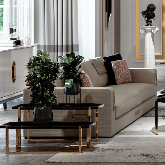 High End Art Deco Style Sofa A sophisticated living room with a High End Art Deco Style Sofa in beige, adorned with patterned and solid pillows. Next to it are modern black and gold side tables topped with lush green potted plants. The room features a white sideboard, large windows with drapes, and stylish decor accents.