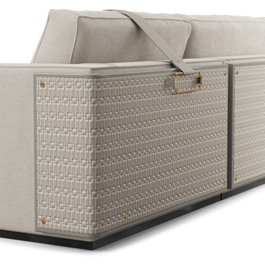 High End Art Deco Style Sofa Side view of the High End Art Deco Style Sofa, showcasing an elegant beige exterior with a textured, woven pattern on its side panel. Adorned with decorative golden studs and a sleek handle, this high-end sofa features clean lines, plush cushions, and integrated hardware, emphasizing its modern design.