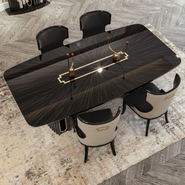 Luxury Art Deco Style Veneer Dining Set Introducing the Luxury Art Deco Style Veneer Dining Set, featuring a sumptuous black veneer table with a radiant design and sophisticated gold trim. The set comes with five plush upholstered chairs in contrasting black and beige hues. Perfectly placed on a patterned rug, this ensemble enhances any space with its elegance, resting gracefully on a herringbone wood floor.