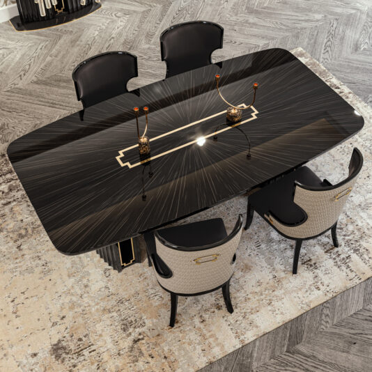 Luxury Art Deco Style Veneer Dining Set Introducing the Luxury Art Deco Style Veneer Dining Set, featuring a sumptuous black veneer table with a radiant design and sophisticated gold trim. The set comes with five plush upholstered chairs in contrasting black and beige hues. Perfectly placed on a patterned rug, this ensemble enhances any space with its elegance, resting gracefully on a herringbone wood floor.