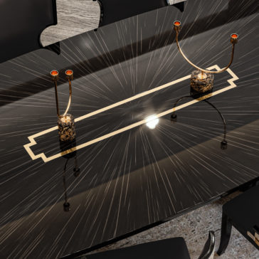 Luxury Art Deco Style Veneer Dining Set Product Name: Luxury Art Deco Style Veneer Dining Set
A sleek, black rectangular table adorned with an exquisite geometric gold inlay serves as the focal point of the Luxury Art Deco Style Veneer Dining Set. Two elegant golden candle holders, featuring gracefully curved arms and red-tipped candles, are symmetrically positioned on the table, accentuating its sophisticated veneer reflection.