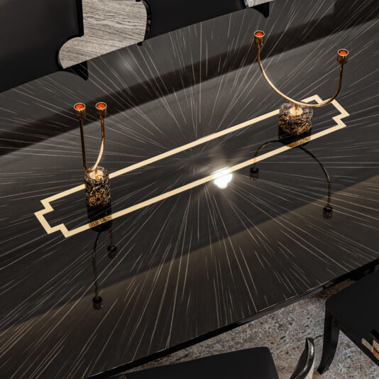 Luxury Art Deco Style Veneer Dining Set Product Name: Luxury Art Deco Style Veneer Dining Set
A sleek, black rectangular table adorned with an exquisite geometric gold inlay serves as the focal point of the Luxury Art Deco Style Veneer Dining Set. Two elegant golden candle holders, featuring gracefully curved arms and red-tipped candles, are symmetrically positioned on the table, accentuating its sophisticated veneer reflection.