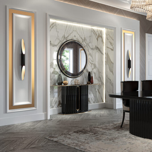 The sophisticated interior features a large circular mirror mounted on a marble wall above the Marble Art Deco Style Console Table. The room includes modern wall sconces, light wood floors, and a rug. On the right, there's a glimpse of a black dining table and chairs.