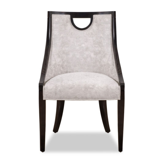 Modern Walnut Luxury Dining Chair The Modern Walnut Luxury Dining Chair is a contemporary piece featuring a dark walnut frame, light grey cushioned backrest and seat, and a cutout handle near the top of the backrest. Its sleek design includes slightly curved legs for added elegance.