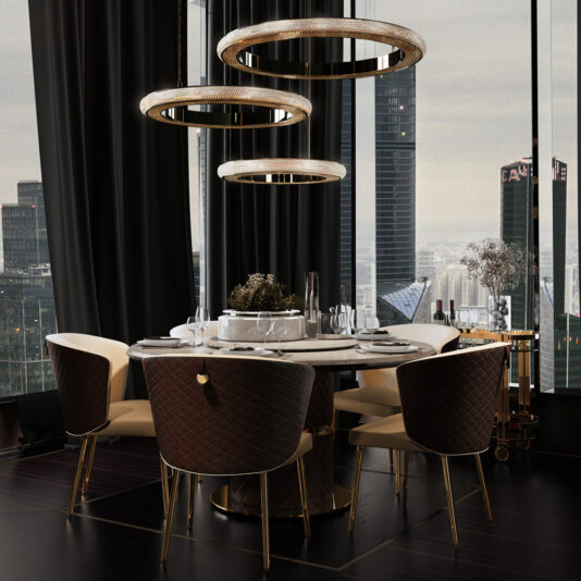 Contemporary Hoop Crystal Chandelier The elegant dining room boasts a circular table set for six, adorned with modern gold-accented chairs and a centerpiece of arranged flowers. Overhead, three large Contemporary Hoop Crystal Chandeliers illuminate the space, while floor-to-ceiling windows offer a breathtaking cityscape view complete with towering buildings.