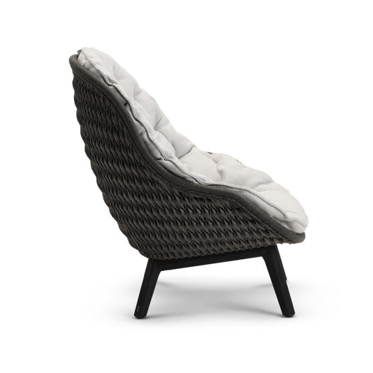 Contemporary Outdoor Woven Armchair Side view of the Contemporary Outdoor Woven Armchair showcasing its rattan frame and light gray cushion. This chair features a slightly reclined backrest and is supported by four black legs. The design offers both comfort and style, making it perfect for indoor and outdoor use.