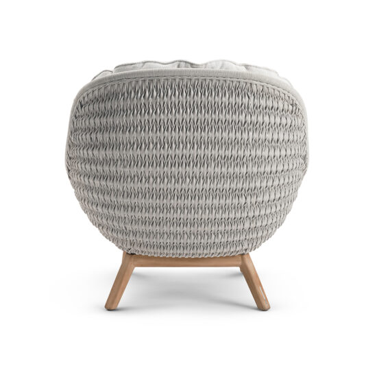 Contemporary Outdoor Woven Armchair The Contemporary Outdoor Woven Armchair features a round, modern design with a textured, woven gray backrest and light wooden legs. It comes with a plush cushion on top for added comfort and style. The plain white background accentuates the armchair's distinctive design.