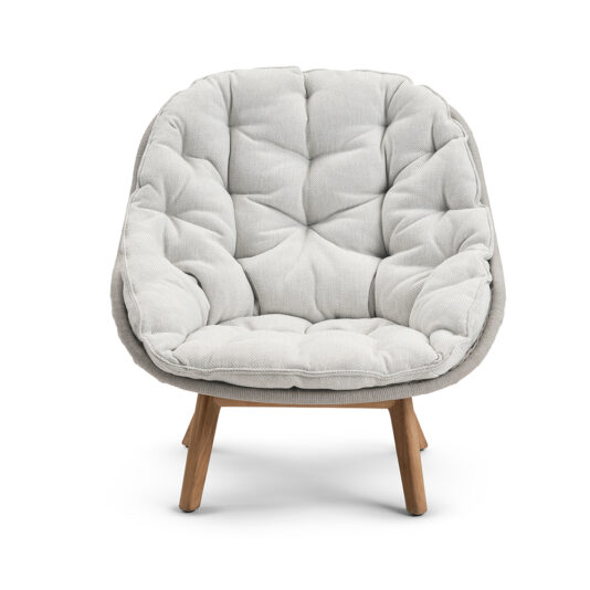 Contemporary Outdoor Woven Armchair The Contemporary Outdoor Woven Armchair is a modern, cozy piece with a soft, light gray cushioned seat and backrest featuring a tufted design. It rests on four angled wooden legs, offering a contemporary yet comfortable look. Ideal for outdoor use, its stylish design seamlessly blends elegance with durability.