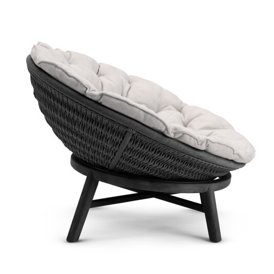 Contemporary Outdoor Woven Daybed The Contemporary Outdoor Woven Daybed boasts a spacious design with a round, black woven frame and sturdy wooden legs, complemented by a plush beige cushion—ideal for enhancing your outdoor living space.