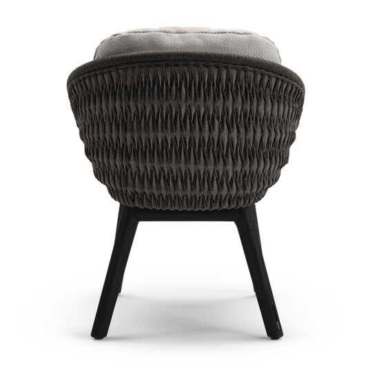 Contemporary Outdoor Woven Dining Chair The rear view of the Contemporary Outdoor Woven Dining Chair showcases its modern design, featuring a rounded back and black wooden legs. The light gray seat cushion provides a striking contrast to the darker, textured weave of the chair, emphasizing both comfort and contemporary style.