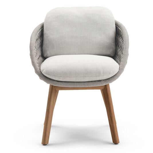 Contemporary Teak Outdoor Dining Set Featuring a contemporary teak outdoor dining set, this chair boasts a cushioned backrest and seat, upholstered in light gray fabric. It showcases a stylish rounded woven design on the sides and back, supported by four angled wooden legs for both comfort and elegance.